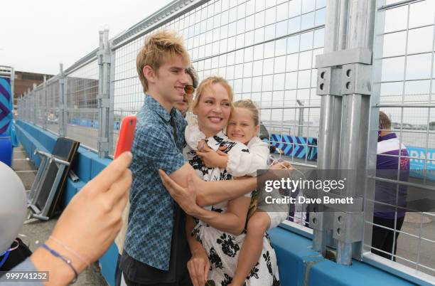 Uma Thurman poses with her children Levon Thurman-Hawke and Luna Thurman-Busson attend the Formula E 2018 Qatar Airways New York City E-Prix, the...