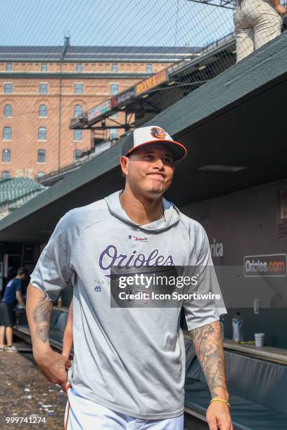 Baltimore Orioles shortstop Manny Machado walks out of the dugout following the game between the Texas Rangers and the Baltimore Orioles on July 15...