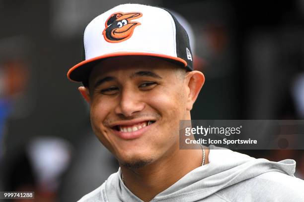 Baltimore Orioles shortstop Manny Machado smiles in the dugout during the game between the Texas Rangers and the Baltimore Orioles on July 15 at...
