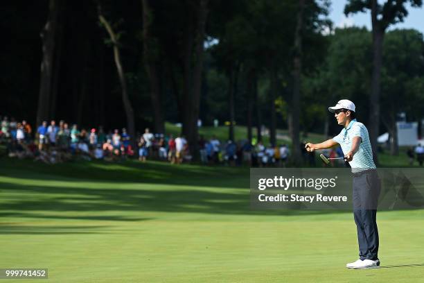 Michael Kim reacts after winning the John Deere Classic at TPC Deere Run on July 15, 2018 in Silvis, Illinois.