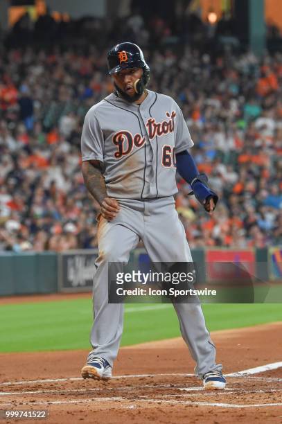 Detroit Tigers infielder Ronny Rodriguez scores a run off a sacrifice fly during the baseball game between the Detroit Tigers and the Houston Astros...