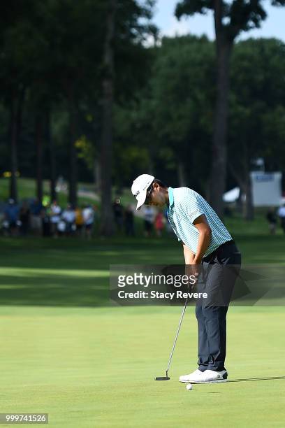 Michael Kim putts for par on the 18th green during the final round of the John Deere Classic at TPC Deere Run on July 15, 2018 in Silvis, Illinois.