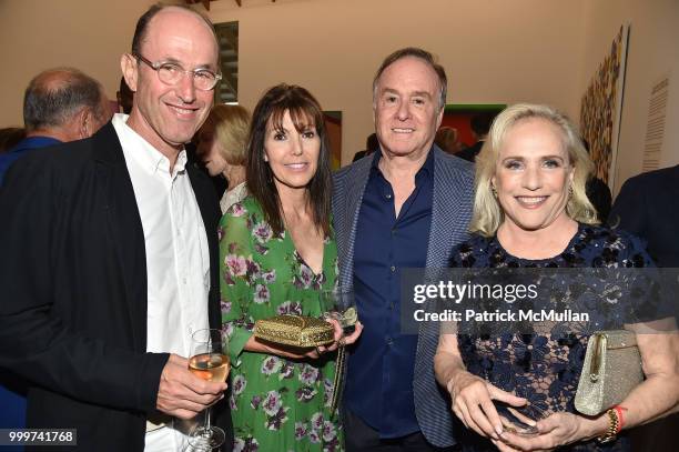 Leon Kalvaria, Barbara Kalvaria, Keith Barish and Ann Barish attend the Parrish Art Museum Midsummer Party 2018 at Parrish Art Museum on July 14,...