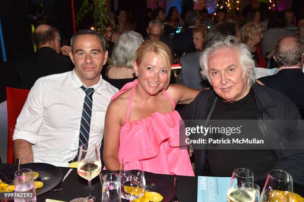 Eric Freeman, Janna Bullock and Tony Shafrazi attend the Parrish Art Museum Midsummer Party 2018 at Parrish Art Museum on July 14, 2018 in Water...