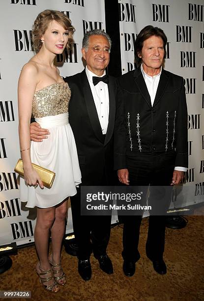 Musician Taylor Swift, musician John Fogerty and BMI President and CEO Del Bryant attend the 58th Annual BMI Pop Awards held at the Beverly Wilshire...