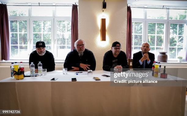 Dirk Faehnrich , Andre Sommer, Django, all members of the Hells Angels MC Nomads and lawyer Uwe Schadt are speaking at a press conference in Berlin,...