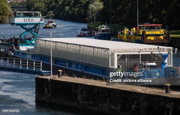 The push boat Edda, used for another transport of castors with nuclear waste of energy company EnBW, arrives at the lock in Horkheim, Germany, 06...