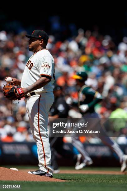 Stephen Piscotty of the Oakland Athletics rounds the bases after hitting a home run off of Reyes Moronta of the San Francisco Giants during the sixth...