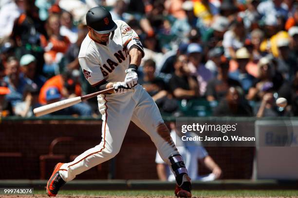 Chase d'Arnaud of the San Francisco Giants hits a home run against the Oakland Athletics during the sixth inning at AT&T Park on July 15, 2018 in San...