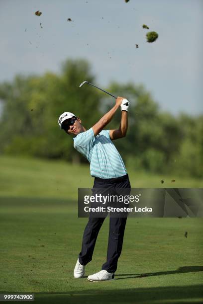 Michael Kim hits a shot on the 18th hole during the final round of the John Deere Classic at TPC Deere Run on July 15, 2018 in Silvis, Illinois.