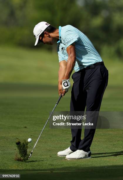 Michael Kim hits a shot on the 18th hole during the final round of the John Deere Classic at TPC Deere Run on July 15, 2018 in Silvis, Illinois.