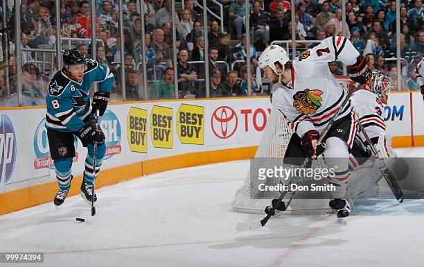 Brent Seabrook of the Chicago Blackhawks, watches Joe Pavelski of the San Jose Sharks in Game Two of the Western Conference Finals during the 2010...