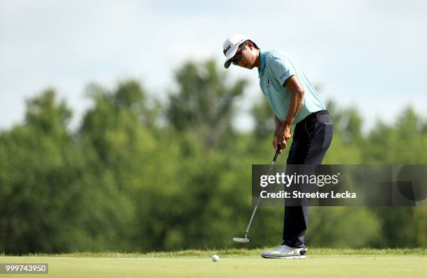 Michael Kim putts the ball on the 16th green during the final round of the John Deere Classic at TPC Deere Run on July 15, 2018 in Silvis, Illinois.