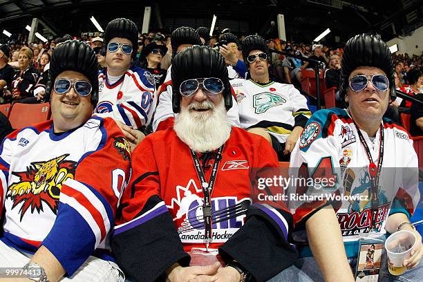 Fans in costumes watch the game between the Moncton Wildcats and Windsor Spitfires during the 2010 Mastercard Memorial Cup Tournament at the Keystone...