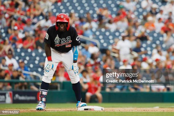 Taylor Trammell of the Cincinnati Reds and the U.S. Team reacts after hitting a triple against the World Team during the SiriusXM All-Star Futures...