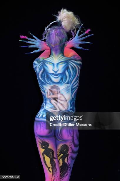 Model, painted by bodypainting artist Sarah Smith from Great Britainl, poses for a picture at the 21st World Bodypainting Festival 2018 on July 14,...