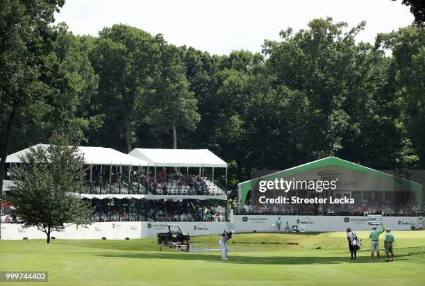 Fabian Gomez of Argentina hits a shot on the 18th hole during the final round of the John Deere Classic at TPC Deere Run on July 15, 2018 in Silvis,...