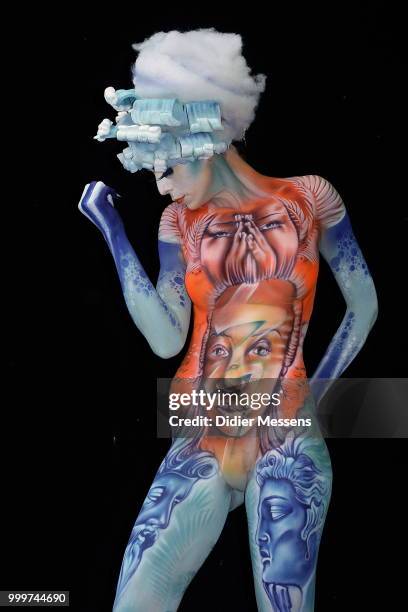 Model, painted by bodypainting artist Benoit Botella from Guadeloupe, poses for a picture at the 21st World Bodypainting Festival 2018 on July 14,...