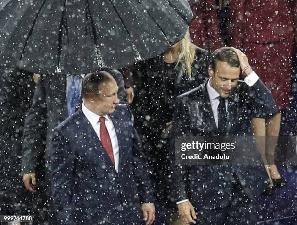 Russian President Vladimir Putin and French President Emmanuel Macron attend the award ceremony of the 2018 FIFA World Cup Russia final at the...