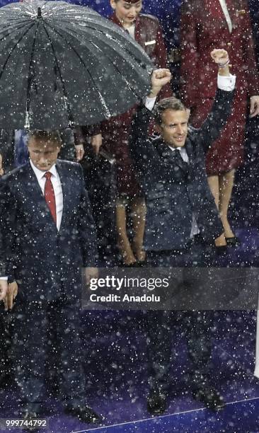 Russian President Vladimir Putin and French President Emmanuel Macron attend the award ceremony of the 2018 FIFA World Cup Russia final at the...