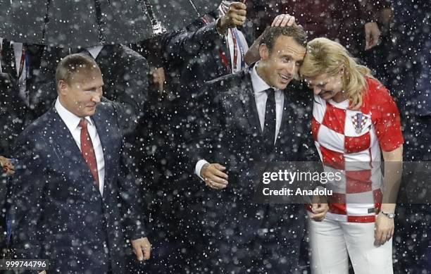 Russian President Vladimir Putin , French President Emmanuel Macron and Croatian President Kolinda Grabar Kitarovic attend the award ceremony of the...