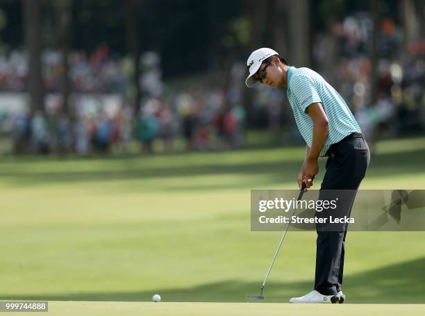 Michael Kim putts the ball on the 17th hole during the final round of the John Deere Classic at TPC Deere Run on July 15, 2018 in Silvis, Illinois.