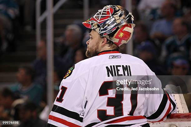 Goaltender Antti Niemi of the Chicago Blackhawks looks on from the net in the third period while taking on the San Jose Sharks in Game Two of the...
