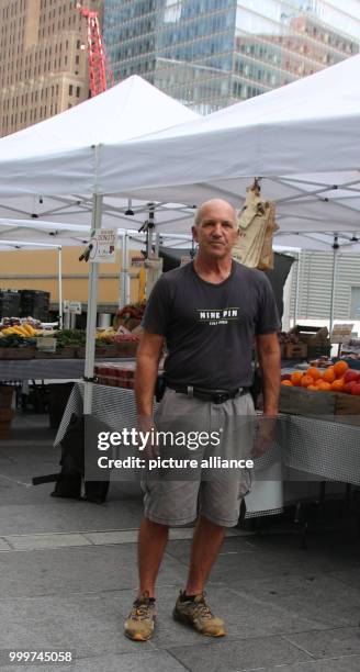 Farmer Ron Samascott at the Greenmarket at Oculus Plaza, a farmers' market at the base of the new World Trade Center in New York, USA, 5 September...