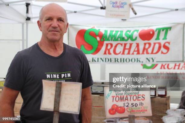 Farmer and grocery vendor Ron Samascott at the Greenmarket at Oculus Plaza, a farmers' market at the base of the new World Trade Center in New York,...