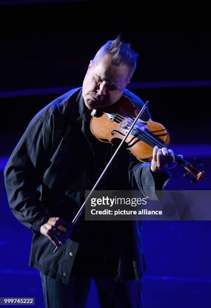 Violinist Nigel Kennedy performs at the German Radio Award 2017 at the Elbphilharmonie concert hall in Hamburg, Germany, 7 September 2017. The prize...
