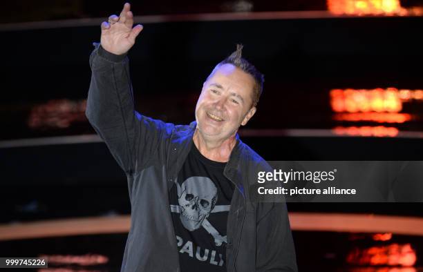 Violinist Nigel Kennedy performs at the German Radio Award 2017 at the Elbphilharmonie concert hall in Hamburg, Germany, 7 September 2017. The prize...