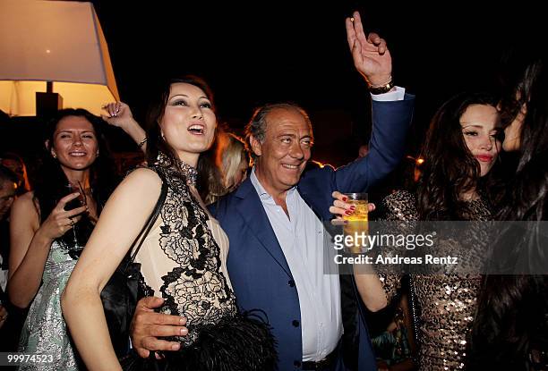 Fawaz Gruosi enjoys Cheryl Cole's performance at the de Grisogono Party at the Hotel Du Cap on May 18, 2010 in Cap D'Antibes, France.