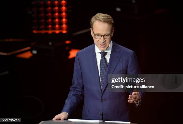 Jens Weidmann, presenter and President of the German Federal Bank, stands on stage at the German Radio Award 2017 at the Elbphilharmonie concert hall...