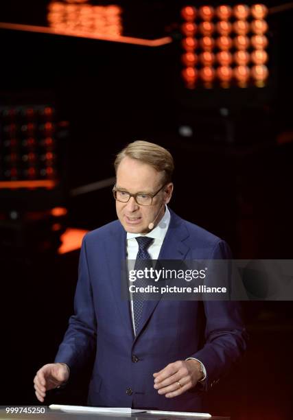 Jens Weidmann, presenter and President of the German Federal Bank, stands on stage at the German Radio Award 2017 at the Elbphilharmonie concert hall...