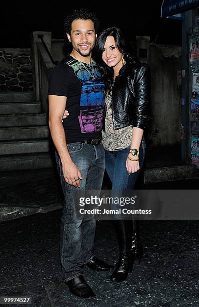 Singer/actor Corbin Bleu and singer/actress Demi Lovato pose backstage after a performance of "In The Heights" at Richard Rodgers Theatre on May 18,...