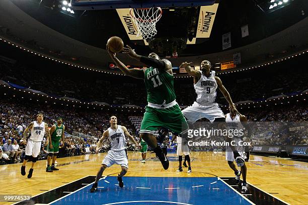 Glen Davis of the Boston Celtics drives for a shot against Rashard Lewis of the Orlando Magic in Game Two of the Eastern Conference Finals during the...