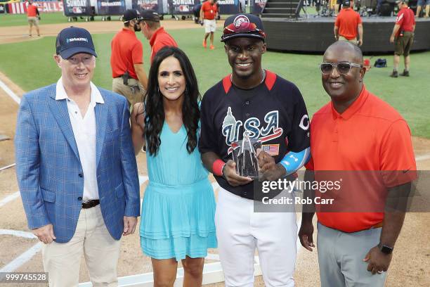 Taylor Trammell of the Cincinnati Reds and the U.S. Team poses with the Larry Doby Award after defeating the World Team in the SiriusXM All-Star...