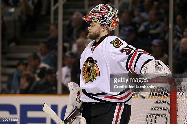 Goaltender Antti Niemi of the Chicago Blackhawks looks on from the net in the third period while taking on the San Jose Sharks in Game Two of the...