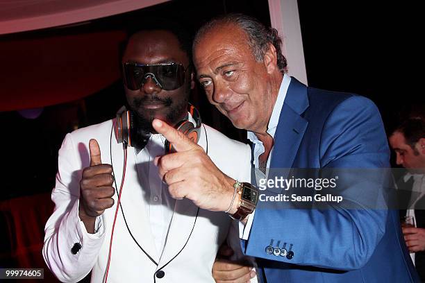 Will.i.am and Fawaz Gruosi attend the de Grisogono Party at the Hotel Du Cap on May 18, 2010 in Cap D'Antibes, France.