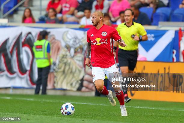 New York Red Bulls midfielder Daniel Royer controls the ball during the firat half of the Major League Soccer game between Sporting Kansas City and...