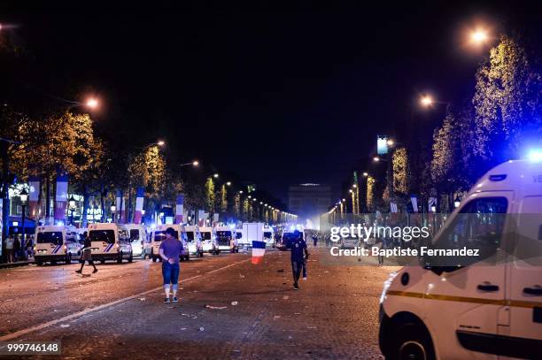 French riot police evacuates the Champs Elysees after the FIFA World cup final match between France and Croatia on July 15, 2018 in Paris, France.