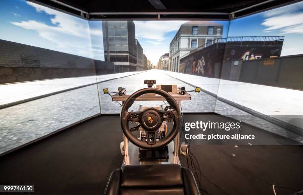 Driving simulator in the Fraunhofer Institute for Industrial Engineering in Stuttgart, Germany, 4 September 2017. Photo: Christoph Schmidt/dpa