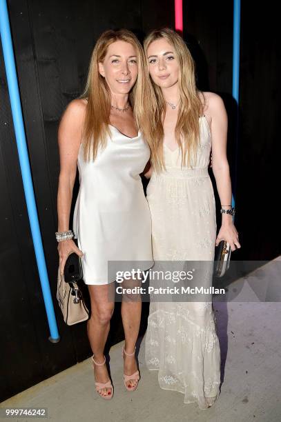 Robyn Rabin and Erica Downs attend the Parrish Art Museum Midsummer Party 2018 at Parrish Art Museum on July 14, 2018 in Water Mill, New York.