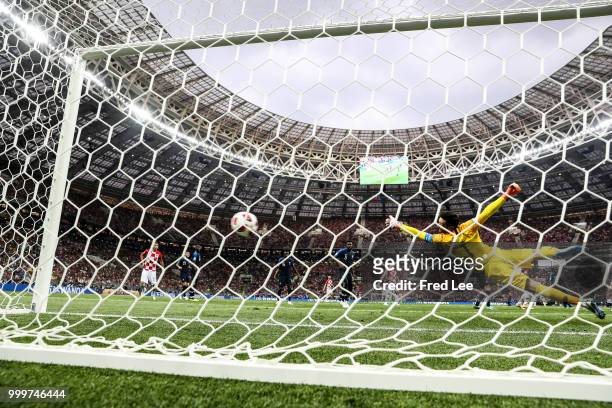 Ivan Perisic of Croatia scores his team's first goal over Hugo Lloris of France to make the score 1-1 during the 2018 FIFA World Cup Final between...