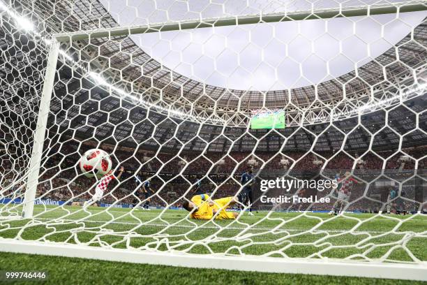 Ivan Perisic of Croatia scores his team's first goal over Hugo Lloris of France to make the score 1-1 during the 2018 FIFA World Cup Final between...