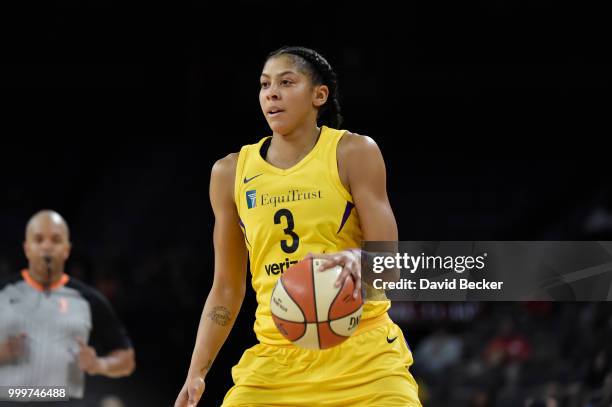 Candace Parker of the Los Angeles Sparks handles the ball against the Las Vegas Aces on July 15, 2018 at the Mandalay Bay Events Center in Las Vegas,...