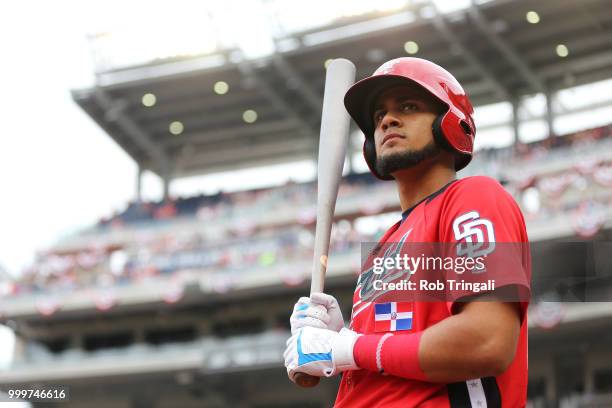 Fernando Tatis Jr. #23 of the World Team looks on during the SiriusXM All-Star Futures Game at Nationals Park on Sunday, July 15, 2018 in Washington,...