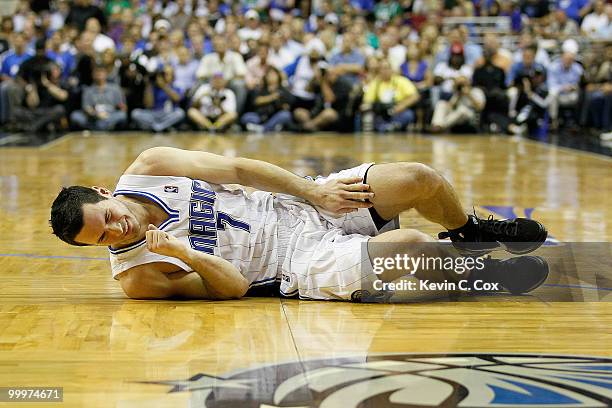 Redick of the Orlando Magic lies on the court in pain against the Boston Celtics in Game Two of the Eastern Conference Finals during the 2010 NBA...