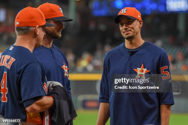 Houston Astros pitcher Gerrit Cole and Houston Astros pitcher Charlie Morton are presented their American League All Star uniforms by Houston Astros...