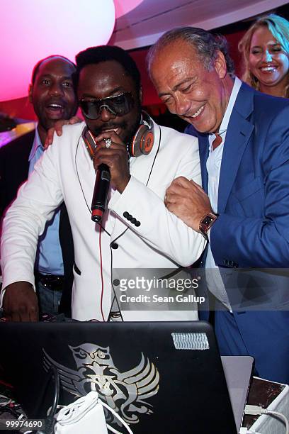 Will.i.am and Fawaz Gruosi attend the de Grisogono Party at the Hotel Du Cap on May 18, 2010 in Cap D'Antibes, France.